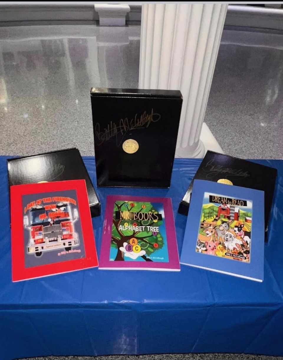 The three Mr Books Shop titles displayed together on a table